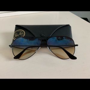 RayBan black aviators with blue tinted lenses